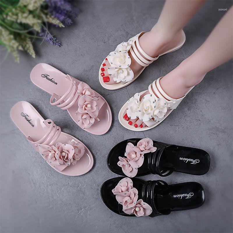 Kapty damskie w stylu koreańskich modnych wodoodpornych kwiatowych plastikowych butów plażowych sandały płaskie wewnętrzne i zewnętrzne