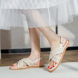 Pequeña moda viento nuevo estilo fragante antideslizante usando sandalias planas con cinturón cruzado mujeres verano Q7t3 # 39257