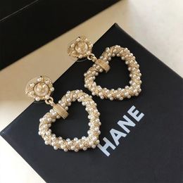 Petit parfum exagéré Love Pearl Orees Boucles féminines S925 Silver Needle Coréen Socialite Tempérament en ligne Célébrités Retro Earres Retro