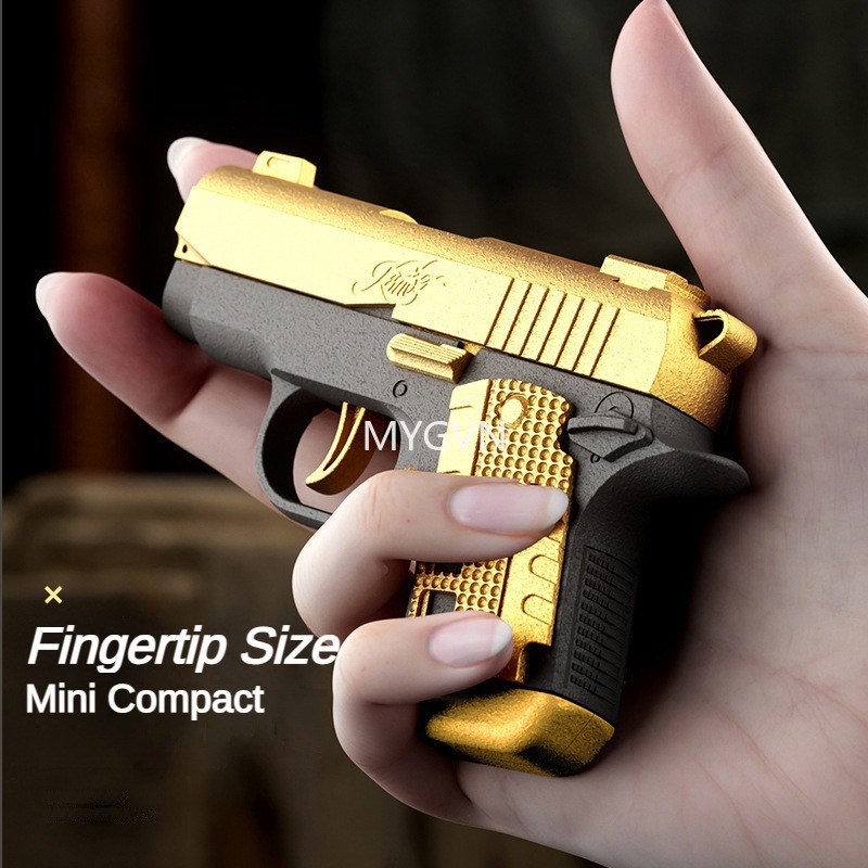 Liten storlek M1911 skal utkastad leksak pistol kontinuerlig skjutblåsning manual mjuka kulor pistoler tomma hänga cs utomhus prop