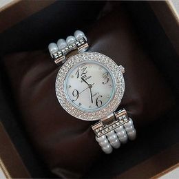 Montres intelligentes Montres-bracelets Nouvelle vente chaude perle de nacre vente mode chaîne strass dames antidérapant résistant à l'usure Exquisite x0706