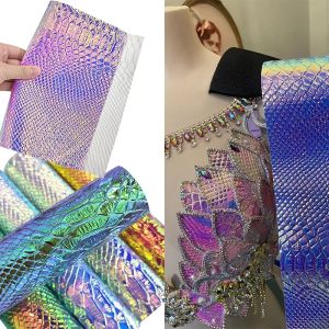 Fabricación de cuero PU de piel de piel de serpiente hojas de cuero con falso holográfico para hacer bolsas/decoración/arete/zapato/artesanía