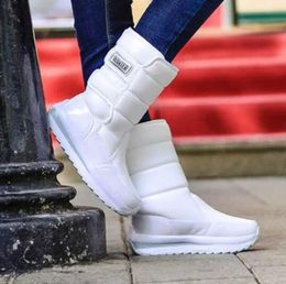 Botas de nieve El invierno más cálido para mujeres yakuda dhgate Zapatos de algodón engrosados Aislamiento de felpa de invierno para mujer de longitud media ligero antideslizante dhgateS Zapatos atléticos