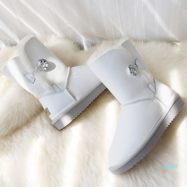 Bottes de neige femmes bottes en peau de mouton véritable chaussures en cuir imperméable blanc laine de mouton bottes fourrure mi-mollet plat femme chaussures d'hiver