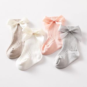 Chaussettes grandes arcs bébé fille softs warm kids bass de couleur solide