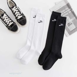 Chaussettes Bonneterie Version coréenne Ins Petit x Lettre NK Croix Crochet Veau En Plastique Haut Tube Chaussettes Enfants Jk Grandes Jambes Longues Sont Minces Respirantes Et À La Mode 6mo5