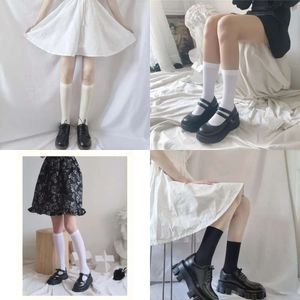 Calcetines mujeres jk negros medias largas delgadas chicas de rodilla altas kawaii calcetines de nylon calcetines femeninos medios de calcetín