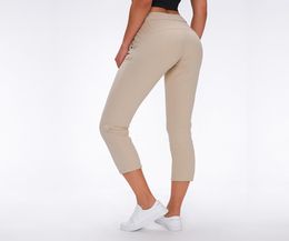 Soft Nakedfeel Fabric Yoga Capris Pantalon Sport Pantalon Femmes TrawString Fitness Running Pantals Sweat With Two Pocket J1213923223