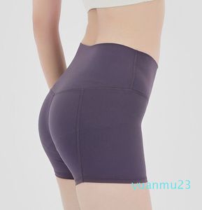 Pantalones cortos elásticos suaves con bolsillo, pantalones cortos deportivos con Control de barriga, pantalones cortos deportivos para correr y Yoga