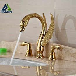 Grifo de baño con acabado dorado y cobre sólido, grifo de lavabo con forma de cisne dorado de lujo, montaje en cubierta de doble manija R231024