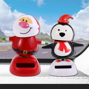 Zonne -schuddendop Doll Solar Swinging Santa Snowman Penguin Swing Figurines auto accessoires auto interieur kinderen speelgoed geschenken