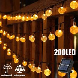Lumières de cordes solaires extérieures 200 LED Crystal Globe Festoon Festoon Fairy Light for Garden Christmas Ramadan Decor 240506