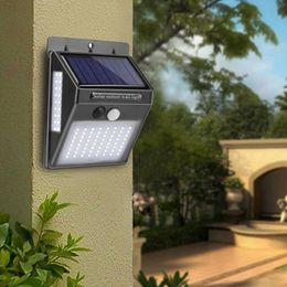 Appliques murales solaires 100 LED Lampe solaire Capteur de mouvement Lumière solaire Lumières de jardin Décoration Lampes à économie d'énergie extérieures étanches
