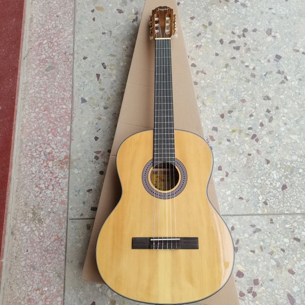 Guitarra clásica con parte superior de cedro macizo, bajo precio, 39 pulgadas, guitarra acústica flamenca, cuerdas de nailon, guitarra acústica clásica popular, hecha en china