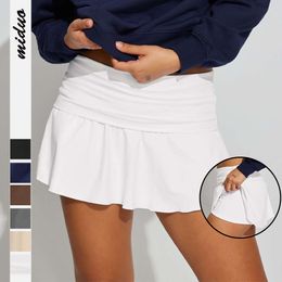 Pantalon de sécurité anti-monnaie en couleur unie à la petite jupe sportive de la petite jupe de sport pour femmes plissées F51430