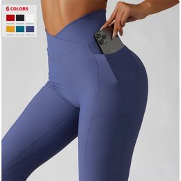 Pantalones de yoga acanalados de color sólido Bolsillos para mujer Crossover Cintura alta Leggings de fitness Sexy Levantamiento de glúteos Entrenamiento Mallas para correr 240102