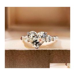 Bague solitaire élégante forme de coeur d'amour clair zircone cubique pierre classique diamant bijoux de mariage pour femmes filles livraison directe Jewe Dhxcv