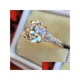 Solitaire ring Hoogwaardige dames mode edelsteen sier verloving voor dames sieraden ronde Gevestigde diamantringen Drop Dhowr