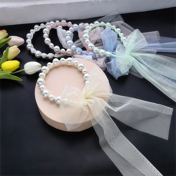 Corea del Sur Bowknot Ribbon Winding Pearl Long Mujeres Niñas Tela Impresión hairjewelry