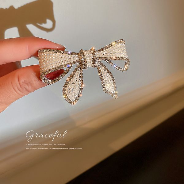 Corée du Sud Diamond Bow Brooch Cirpus Clips épingles brillantes Barrette Bown Knot Barrette Barrette Clips pour femmes en gros