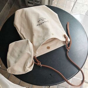 Bolso de hombro de lona empalmado East Gate de Corea del Sur, bolso de lona con letras cruzadas versátil e informal de Instagram 240315