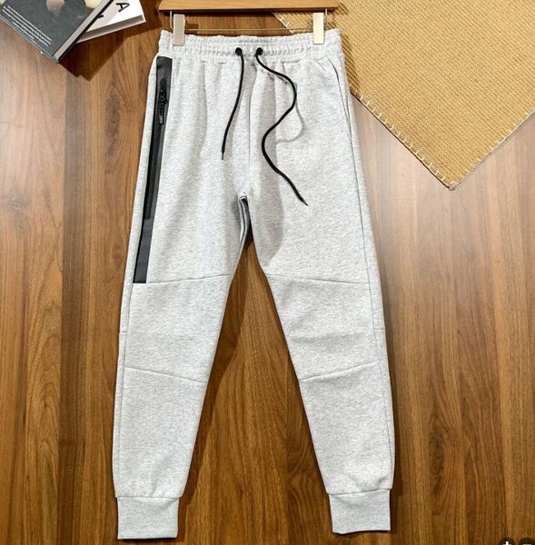 Space Cotton Tech Sports Pants Men Spring and Autumn New Presión Rubierra Long Zipper Pantalones informales pantalones