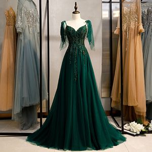 Vestido de noche para banquete espagueti, nueva cola pequeña, elegante vestido de fiesta verde oscuro, vestido de fiesta