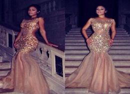 Sparkling Gold Crystal Mermaid Robes de bal 2018 Myriam Fares Voir à travers le champagne Rangs de soirée à paillettes Champagne Pageant 4731572