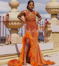 Sparkly Pailles Orange Prom -jurken met spleet 2024 Plus Size Aso Ebi Mermaid Evening Jurk Elegant Black Women Feather Formal Dress Diamond Crystal Ceremony Party