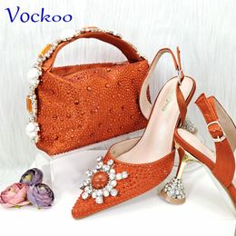 Speciaal ontwerp Hoge kwaliteit oranje kleur Afrikaanse damesschoenen en tassenset met stralend kristal voor huwelijksfeest 240106