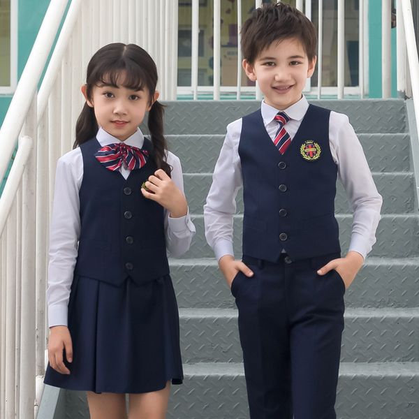 Ocasiones especiales Niño Coreano Uniforme escolar japonés para niño niña Camisa blanca Falda azul marino Pantalones Chaleco Chaleco Corbata Conjunto de ropa Traje de estudiante Traje 230825