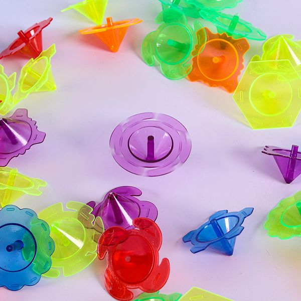 Toupie 100pcs Mini Tops Clignotant Nouveauté En Vrac Enfants Spin Jouets Party Favors Bundle Pack Coloré En Plastique Gyroscopes Jouet 230626