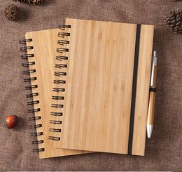 Cuaderno espiral Cubierta de bambú de madera con pluma Bloc de notas ambientales para estudiantes Útiles escolares al por mayor