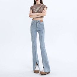 Jeans micro-fustiles divisés pour femmes printemps / été 2024 Nouvelle fille épicée pantalon élastique à la taille élastique à la taille élastique