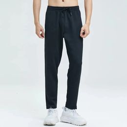 Pantalon sportif pantalon masculin hétéro rapide printemps décontracté automne et victoire à cyclisme tissé d'hiver fitness 240418