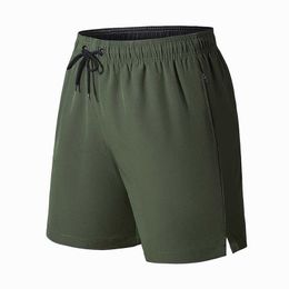 Pantalones cortos deportivos para hombre, pantalones de secado rápido, pantalones Capri, pantalones sueltos de playa, pantalones de cuarto para hombre, calzones