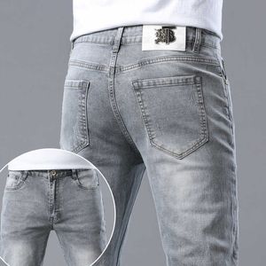 Printemps 2023 Jeans minces pour hommes coréens édition slim slim haut de gamme européenne fumée by pantalon de famille