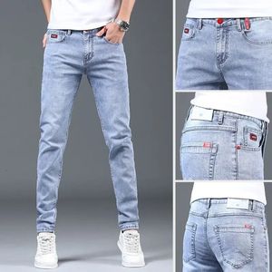 Printemps et automne bleu lavé mode coréenne décontracté solide mince Cowboy Stretch Denim adolescents pantalons de luxe serré hommes jean 240117