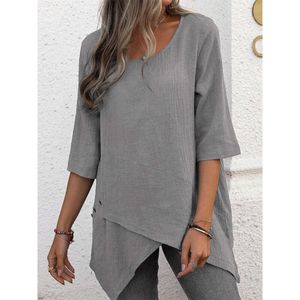 Printemps et automne femmes européennes et américaines nouvelle tendance à la mode femmes coton et lin col rond chemise irrégulière haut à manches 5/4 T-shirt