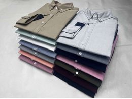 Polos de printemps et d'automne Coton Pure Coton Oxford Spinning Shirt Long Manched Business Business Color Solid Simple Non Fering Men 1125ess