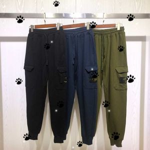 Printemps et automne nouvelle marque de mode étiquette latérale double poche Terry cordon de serrage pantalon de protection pour hommes et femmes pantalons décontractés de couleur unie en vrac