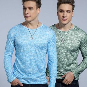 Printemps et automne nouveau T-shirt à manches longues pour hommes solide Lycra solide jeunesse hommes tendance de la personnalité