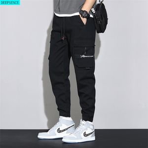 Printemps et été grands hommes pantalons tricotés pantalons de sport Version coréenne ample de salopette tout-Match 220325