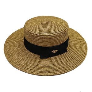 Lente en zomer Europese en Amerikaanse retro goud geweven strohoed Little Bee dames modieuze brede romp zonnebrandreizen Sunshade Flat-Top Hat