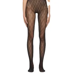 Printemps et été nouvelles chaussettes Sexy de haute qualité évider lettres à la mode femmes Ins même Style résille Leggings collants