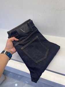 Printemps et été nouveaux jeans pour hommes matériau extensible confortable pantalon crayon bleu foncé luxe simple couleur unie top jeans design