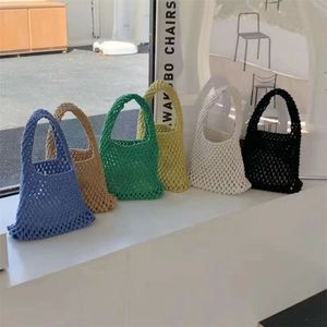 Lente en zomer nieuwe pure handgeweven katoenen string holle tas ins stijl verse foto handtas kleurrijke handgeweven tas
