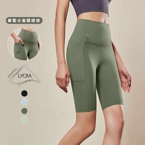 Printemps et été New Qcfe Lycra No Embarrasment Line Exercice de levage de la hanche Fiess Yoga Taille haute Pocket Sports Leggings pour femmes
