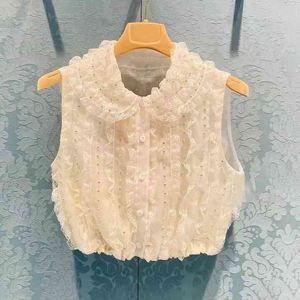 Primavera y verano nuevo estilo bebé cuello camisa encaje corto sin mangas industria pesada diamante Organza mujeres