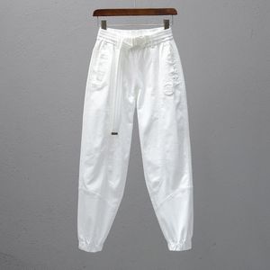 Lente en zomer joggingbroek dames effen witte katoenen harembroek elastische taille losse casual broek met riem enkel